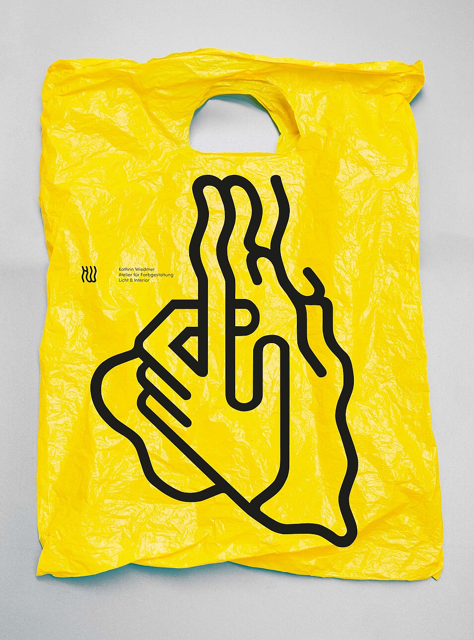 kathrin wiedmer plastic bag logo yellow branding bern